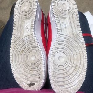 Men 8.5, Red Nike Air Force Ones. In pretty good shape! washed, need new laces.